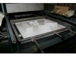 The styrene moulding machine in action.